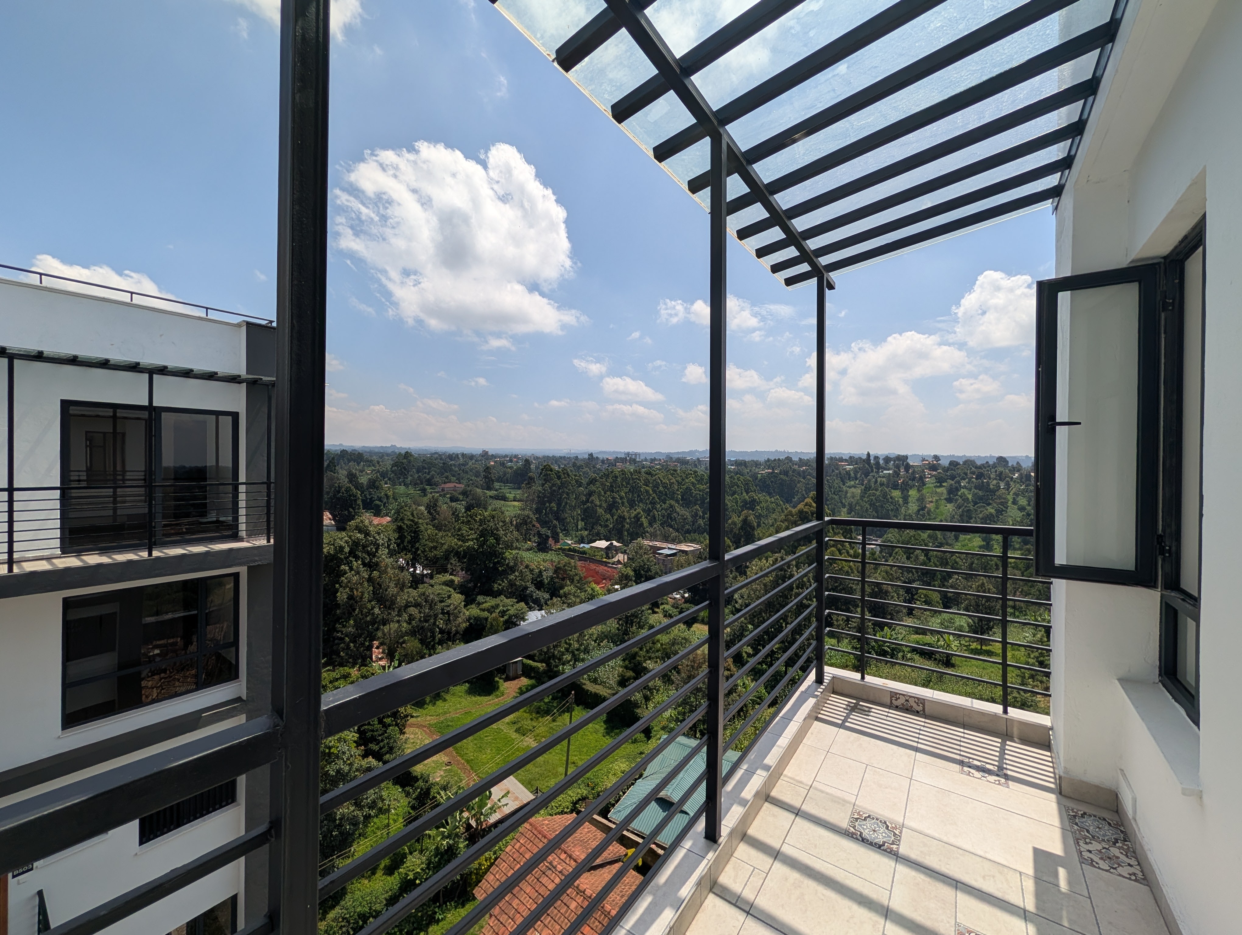 Balcony with pergola and panoramic green view