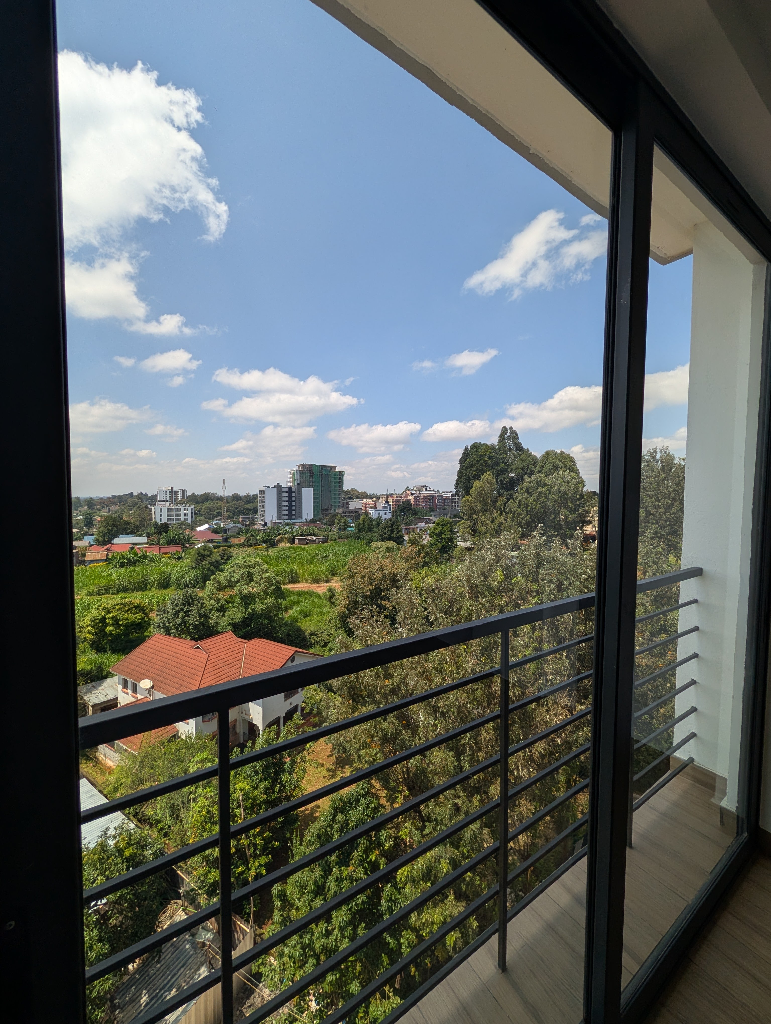 City skyline through glass doors